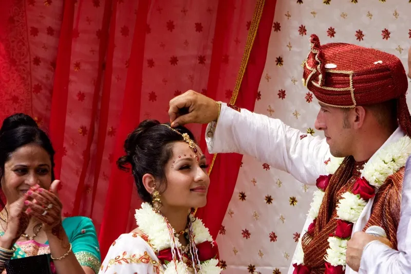 Traditional wedding ritual during destination wedding ceremony
